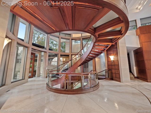 4790 Dow Ridge Rd, Orchard Lake, MI 48324 - stairway with a towering ceiling