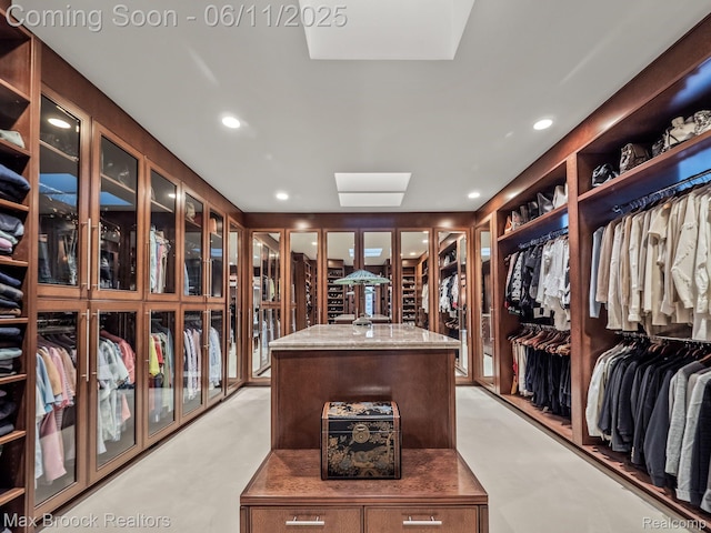 4790 Dow Ridge Rd, Orchard Lake, MI 48324 - walk in closet featuring a skylight