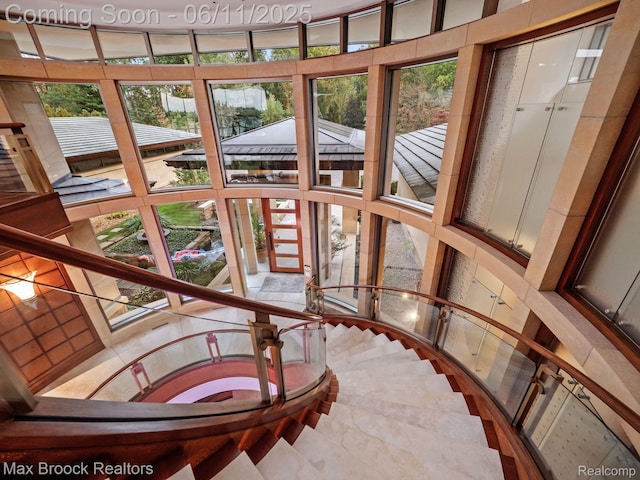 4790 Dow Ridge Rd, Orchard Lake, MI 48324 - staircase with healthy amount of natural light