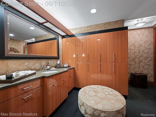4790 Dow Ridge Rd, Orchard Lake, MI 48324 - bathroom featuring wallpapered walls and vanity