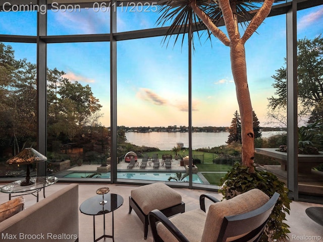 4790 Dow Ridge Rd, Orchard Lake, MI 48324 - sunroom / solarium with a water view and expansive windows