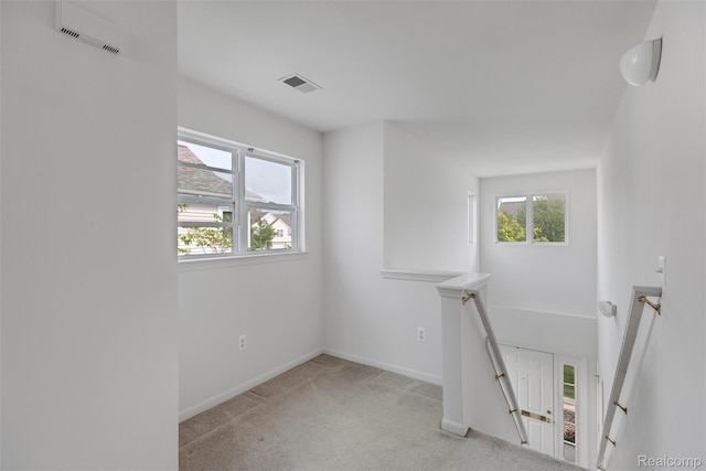 612 Riverstone Ln Unit 75, Chelsea, MI 48118 - empty room featuring carpet and baseboards