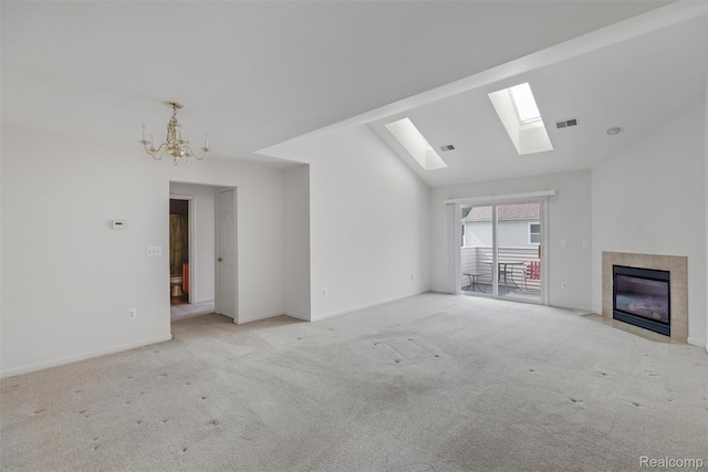 612 Riverstone Ln Unit 75, Chelsea, MI 48118 - unfurnished living room with carpet, a chandelier, lofted ceiling, a fireplace, and a skylight