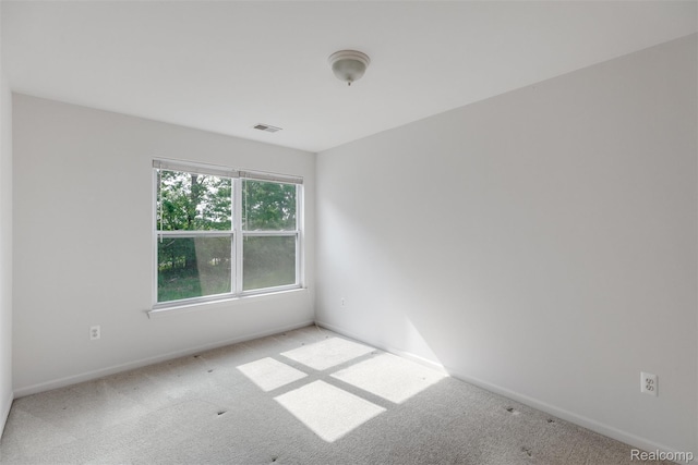 612 Riverstone Ln Unit 75, Chelsea, MI 48118 - carpeted empty room featuring baseboards