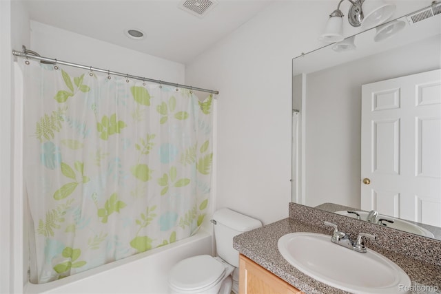 612 Riverstone Ln Unit 75, Chelsea, MI 48118 - bathroom featuring vanity, toilet, and shower / bath combo