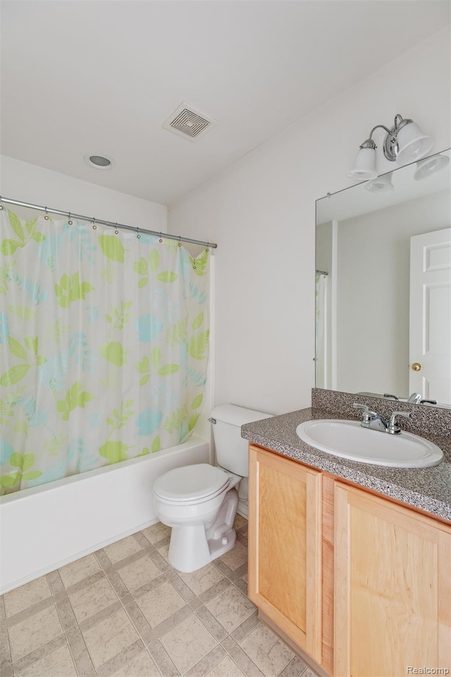 612 Riverstone Ln Unit 75, Chelsea, MI 48118 - bathroom with vanity, toilet, and shower / tub combo
