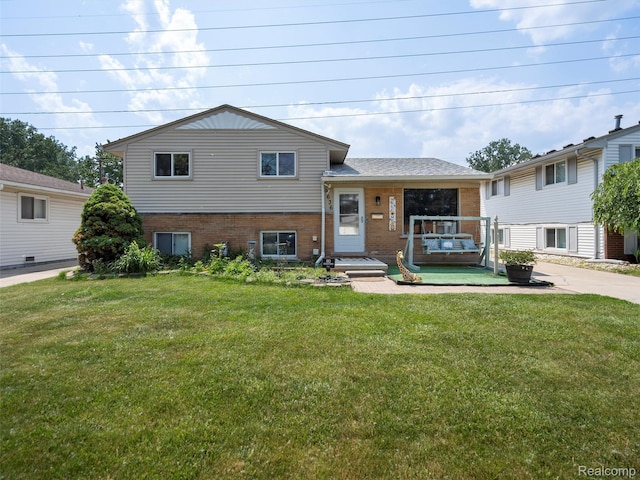 9636 Mueller St, Taylor, MI 48180 - split level home with brick siding and a front lawn
