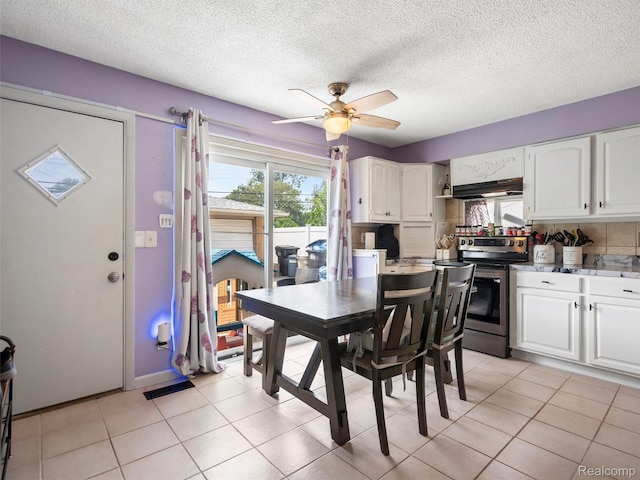 9636 Mueller St, Taylor, MI 48180 - dining room with healthy amount of natural light, ceiling fan, a textured ceiling, and light tile patterned flooring