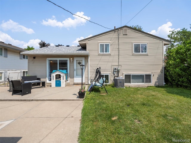 9636 Mueller St, Taylor, MI 48180 - back of house with a patio area, a lawn, and an outdoor hangout area