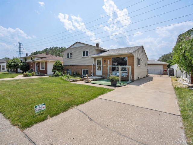9636 Mueller St, Taylor, MI 48180 - split level home featuring brick siding, a front lawn, a porch, and a garage