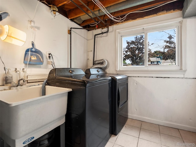 9636 Mueller St, Taylor, MI 48180 - washroom featuring light tile patterned floors and washer and dryer