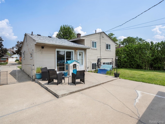 9636 Mueller St, Taylor, MI 48180 - back of property with a patio, a gate, and a chimney