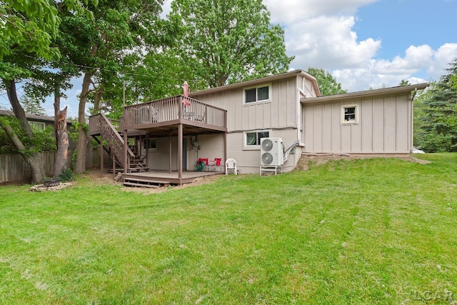 311 Marion St, Clinton, MI 49236 - rear view of house with a wooden deck, ac unit, stairs, board and batten siding, and an outdoor fire pit