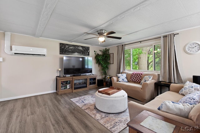 311 Marion St, Clinton, MI 49236 - living room featuring a wall mounted AC, wood finished floors, ceiling fan, and baseboards