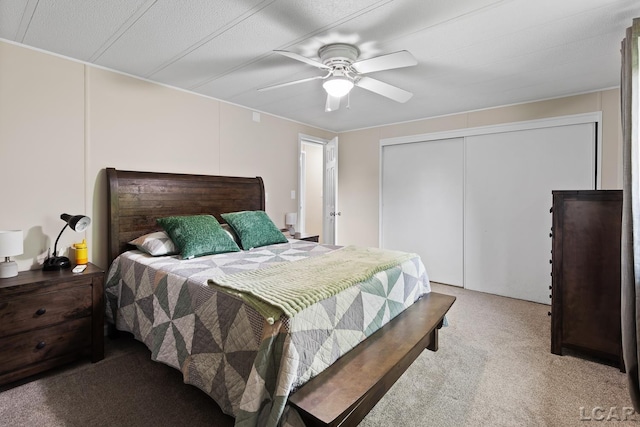 311 Marion St, Clinton, MI 49236 - bedroom with light colored carpet, a closet, and ceiling fan