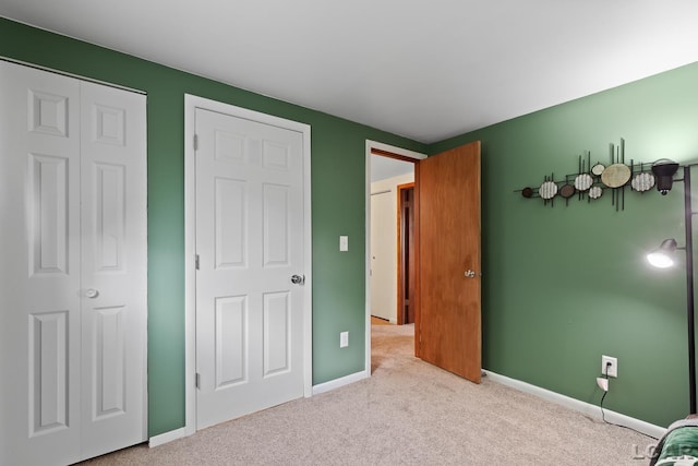311 Marion St, Clinton, MI 49236 - unfurnished bedroom with carpet flooring and baseboards