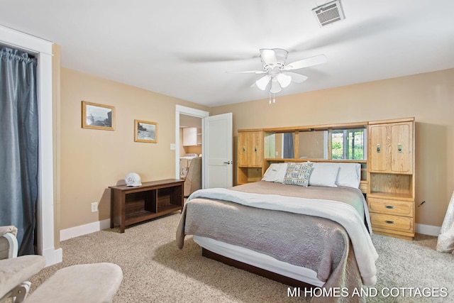 2338 Crescent Walk, Macatawa, MI 49434 - carpeted bedroom featuring baseboards and a ceiling fan