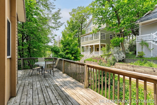 2338 Crescent Walk, Macatawa, MI 49434 - wooden terrace with outdoor dining space
