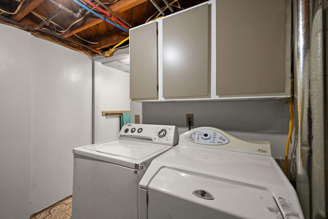 3618 Grape Ave NE, Grand Rapids, MI 49525 - laundry area with cabinet space and separate washer and dryer