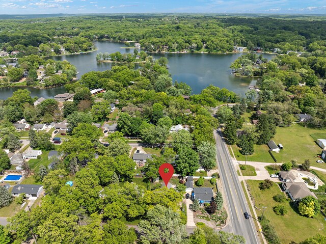 3618 Grape Ave NE, Grand Rapids, MI 49525 - bird's eye view of a nearby body of water and a heavily wooded area