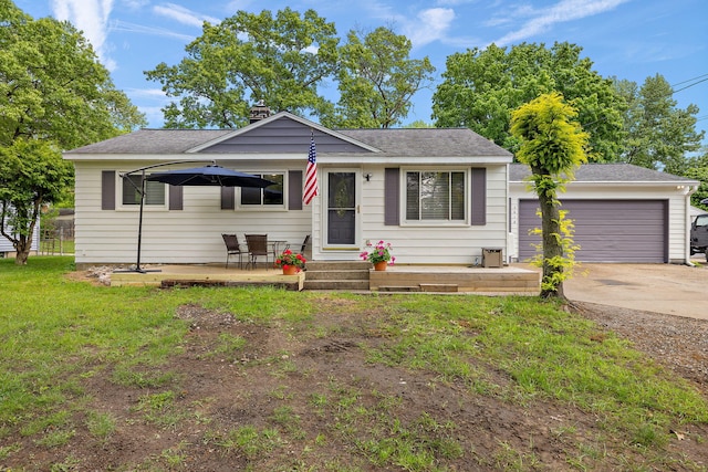 3618 Grape Ave NE, Grand Rapids, MI 49525 - view of front of property featuring driveway, a front lawn, a chimney, and roof with shingles