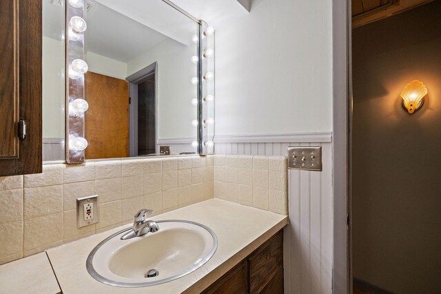 3618 Grape Ave NE, Grand Rapids, MI 49525 - bathroom featuring vanity and decorative backsplash