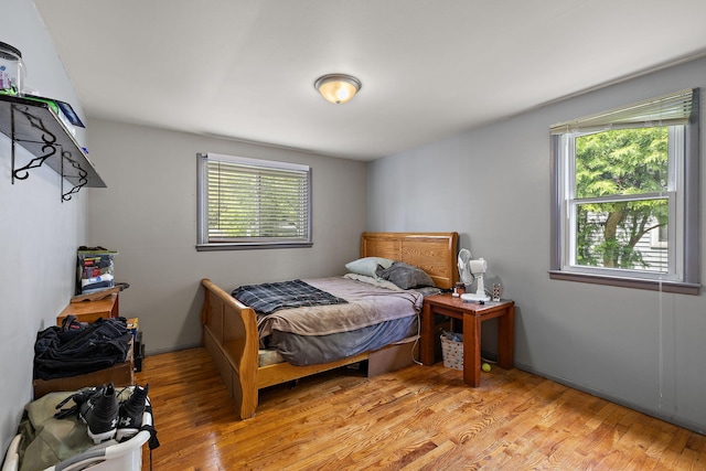 3618 Grape Ave NE, Grand Rapids, MI 49525 - bedroom with multiple windows and light wood-style floors