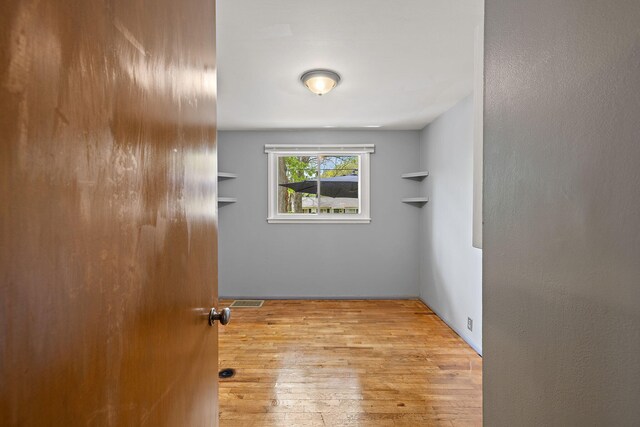 3618 Grape Ave NE, Grand Rapids, MI 49525 - spare room featuring hardwood / wood-style flooring