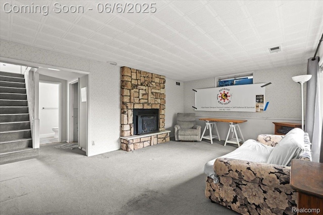 219 Beaver St, Brighton, MI 48116 - living room with stairway, carpet flooring, and a fireplace