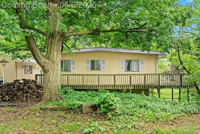 219 Beaver St, Brighton, MI 48116 - view of home's exterior with a deck