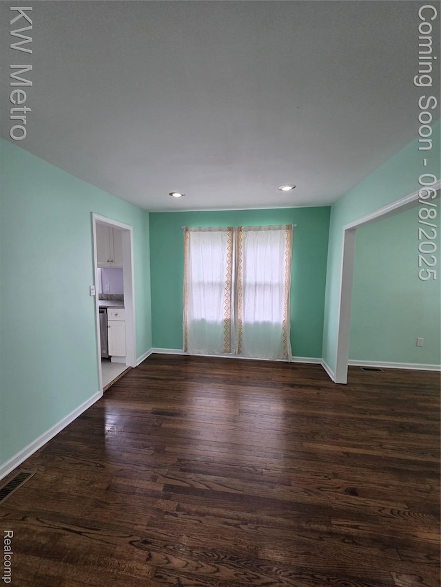 23328 Harding Ave, Hazel Park, MI 48030 - spare room featuring dark wood-style flooring, baseboards, and recessed lighting