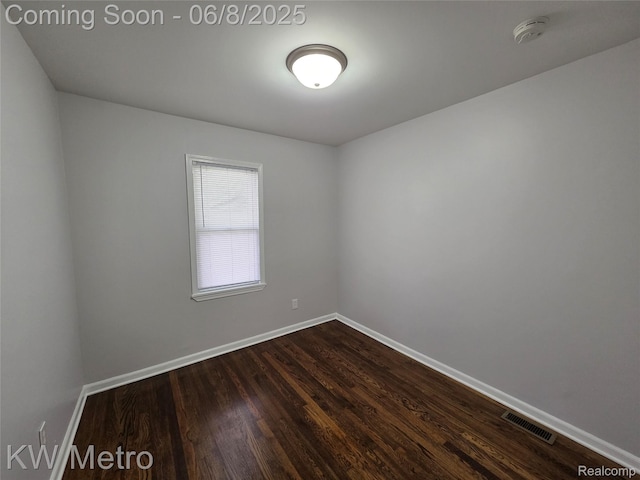 23328 Harding Ave, Hazel Park, MI 48030 - empty room featuring a smoke detector, dark wood finished floors, and baseboards