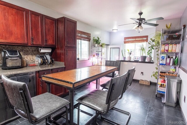 23400 Reynolds Ave, Hazel Park, MI 48030 - kitchen with ceiling fan, reddish brown cabinets, backsplash, and light countertops