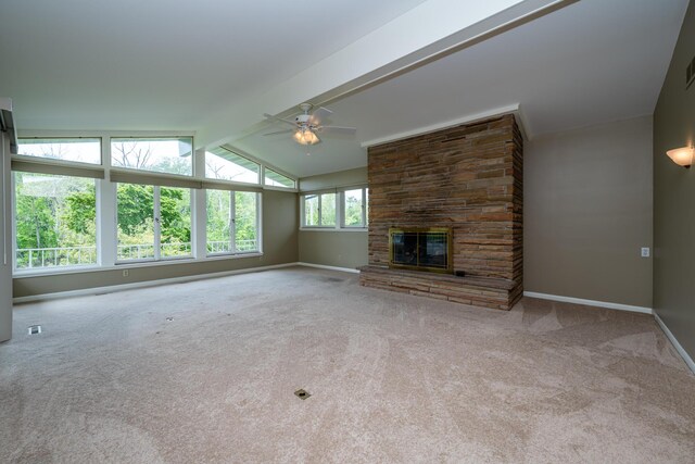 2310 Riverbend Dr, Benton Harbor, MI 49022 - unfurnished living room featuring carpet floors, ceiling fan, baseboards, and a fireplace