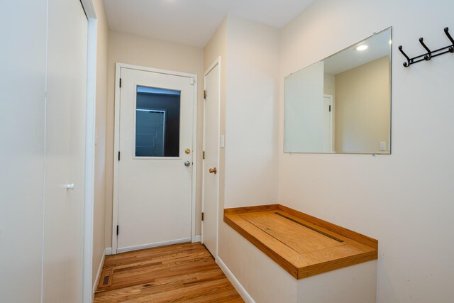 2310 Riverbend Dr, Benton Harbor, MI 49022 - hallway featuring light wood finished floors, recessed lighting, and baseboards