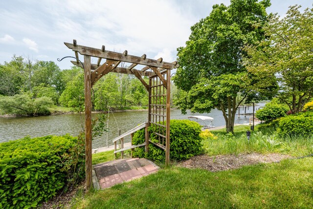 2310 Riverbend Dr, Benton Harbor, MI 49022 - view of yard featuring a water view and a pergola