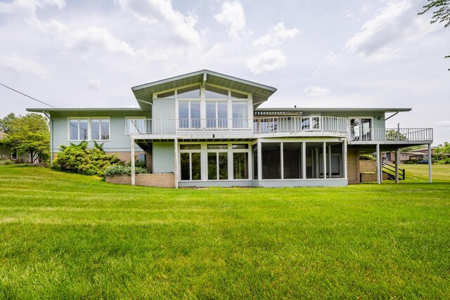 2310 Riverbend Dr, Benton Harbor, MI 49022 - back of property with a sunroom, a yard, a deck, and stairway