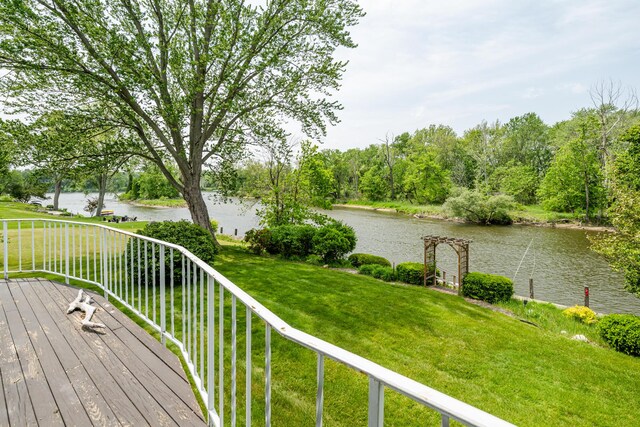 2310 Riverbend Dr, Benton Harbor, MI 49022 - wooden terrace with a water view and a lawn