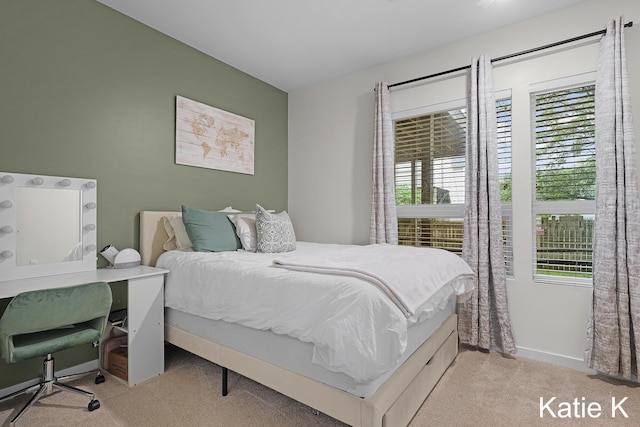 600 Douglas Ave NW Unit 612A, Grand Rapids, MI 49504 - bedroom featuring light carpet and baseboards