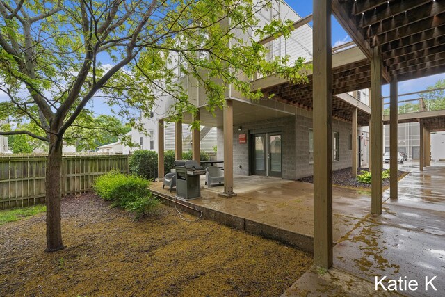 600 Douglas Ave NW Unit 612A, Grand Rapids, MI 49504 - view of yard featuring french doors and a patio area