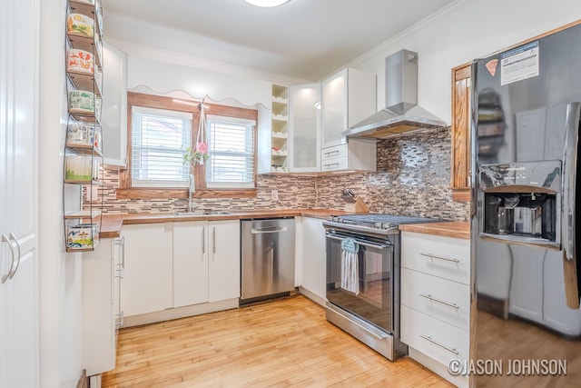1836 Silver Ave SE, Grand Rapids, MI 49507 - kitchen featuring butcher block countertops, wall chimney range hood, fridge with ice dispenser, range, and dishwasher