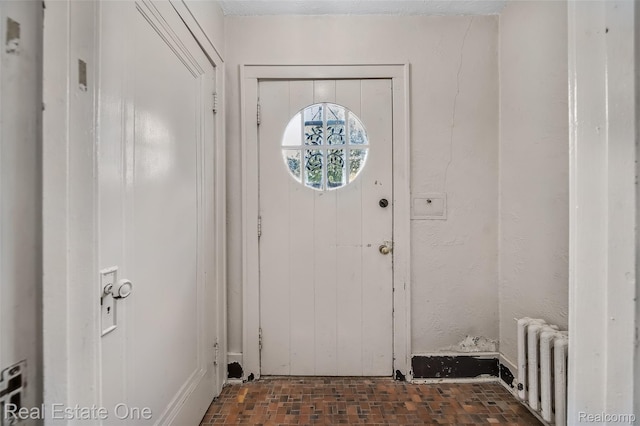 326 W Iroquois Rd, Pontiac, MI 48341 - entrance foyer featuring radiator heating unit