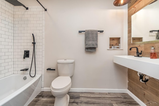 6835 Hackett Rd, Freeland, MI 48623 - bathroom with wood finished floors, shower / washtub combination, and decorative backsplash