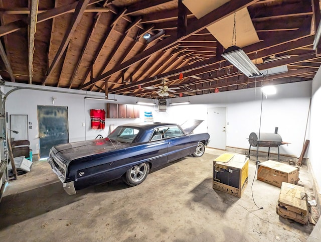 208 State St, Bay City, MI 48706 - garage with a garage door opener and a central vacuum unit