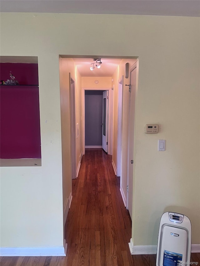 140 Pershing Dr NE, Grand Rapids, MI 49505 - corridor featuring wood finished floors and baseboards