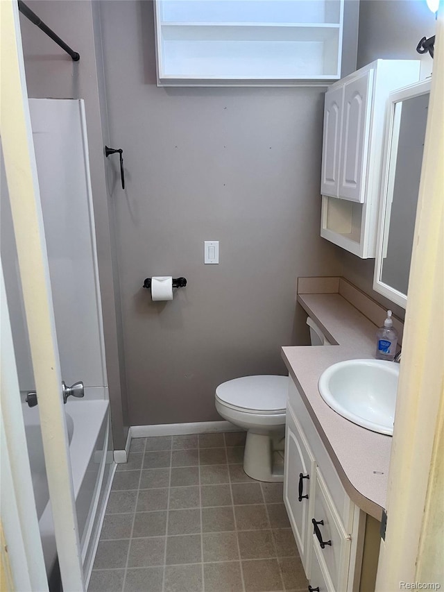 140 Pershing Dr NE, Grand Rapids, MI 49505 - bathroom featuring vanity, shower / bath combination, and tile patterned floors