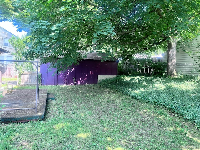 140 Pershing Dr NE, Grand Rapids, MI 49505 - view of yard featuring a shed