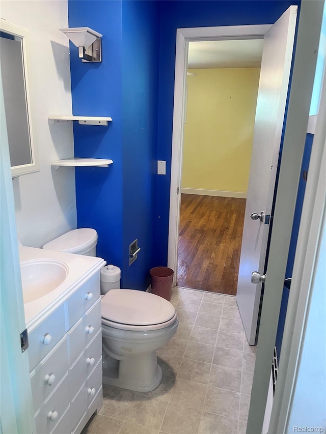 140 Pershing Dr NE, Grand Rapids, MI 49505 - half bath with vanity and tile patterned flooring