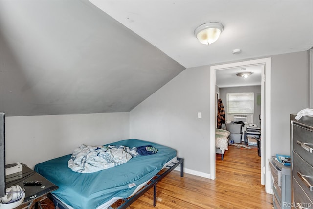 19200 Goulburn St, Detroit, MI 48205 - bedroom with light wood-style flooring and vaulted ceiling