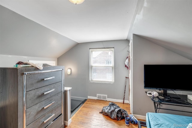 19200 Goulburn St, Detroit, MI 48205 - bedroom featuring light wood-type flooring, vaulted ceiling, and baseboards